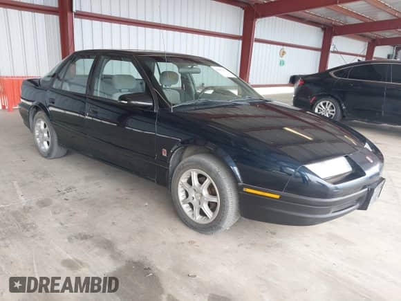 1995 Saturn SL with VIN 1G8ZG5280SZ198686, listed as a IAAI auction lot 42807601 with 294,281 mi miles and . Bid and sale history available at DreamBid. Image 1.