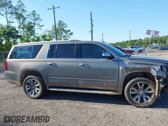 2019 Chevrolet Suburban Premier with VIN 1GNSCJKC3KR129739, listed as a IAAI auction lot 42044708 with 105,771 mi miles and . Bid and sale history available at DreamBid. Image 13.