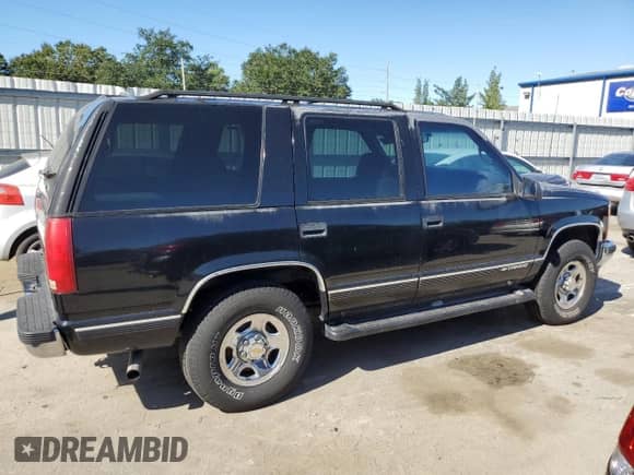 1999 Chevrolet Tahoe Z71 с VIN 1GNEK13R3XJ365011, выставлен на аукционе Copart как лот 87405075 с пробегом 238 678 миль миль и Чистый • Clean title. История ставок и продаж доступна на DreamBid. Изображение 3.