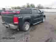 2013 GMC Sierra 1500 SLE z VIN 3GTP2VE75DG231117, wystawiony jako IAAI lot #43475156 z przebiegiem 99 209 mil mil oraz . Historia ofert i sprzedaży dostępna na DreamBid. Obrazek 4.