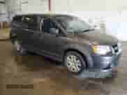 2018 Dodge Grand Caravan SE z VIN 2C4RDGBG5JR312871, wystawiony jako Copart lot #69593385 z przebiegiem 159 455 mil mil oraz Czysty tytuł • Clean title. Historia ofert i sprzedaży dostępna na DreamBid. Obrazek 4.