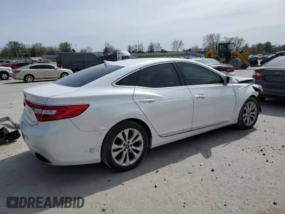 2013 Hyundai Azera с VIN KMHFG4JG2DA218865, выставлен на аукционе Copart как лот 51301965 с пробегом 135 506 миль миль и Списание • Salvage title. История ставок и продаж доступна на DreamBid. Изображение 3.