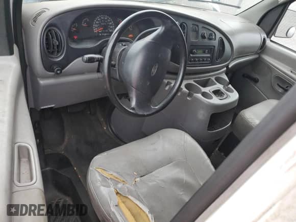 2001 Ford Econoline Cargo z VIN 1FTRE142X1HB27593, wystawiony jako Copart lot #83827154 z przebiegiem 190 761 mil mil oraz Szkoda całkowita • Salvage title. Historia ofert i sprzedaży dostępna na DreamBid. Obrazek 8.