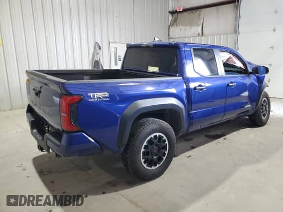 2024 Toyota Tacoma TRD Off Road with VIN 3TMLB5JN6RM026286, listed as a Copart auction lot 81666825 with 27,497 mi miles and Salvage title. Bid and sale history available at DreamBid. Image 3.