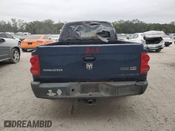 2006 Dodge Dakota ST z VIN 1D7HW28N46S517804, wystawiony jako Copart lot #83544284 z przebiegiem Nie podano mil oraz Szkoda całkowita • Salvage title. Historia ofert i sprzedaży dostępna na DreamBid. Obrazek 6.