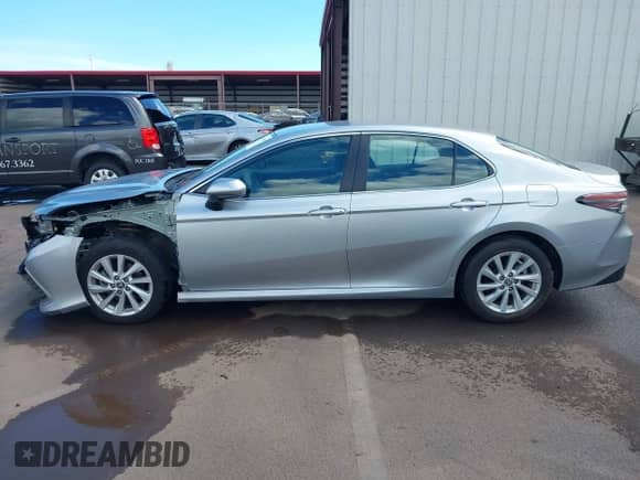 2023 Toyota Camry LE with VIN 4T1C11AK1PU115527, listed as a IAAI auction lot 43097637 with 23,926 mi miles and . Bid and sale history available at DreamBid. Image 15.