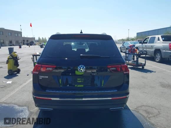 2021 Volkswagen Tiguan SE with VIN 3VV3B7AX4MM127236, listed as a IAAI auction lot 43100517 with 48,229 mi miles and . Bid and sale history available at DreamBid. Image 16.