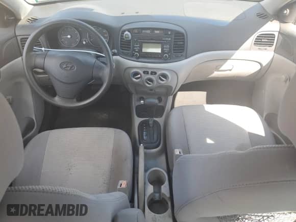 2011 Hyundai Accent GLS z VIN KMHCN4AC0BU593493, wystawiony jako Copart lot #69999845 z przebiegiem 128 388 mil mil oraz Szkoda całkowita • Salvage title. Historia ofert i sprzedaży dostępna na DreamBid. Obrazek 8.