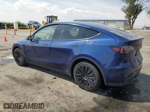 2023 Tesla Model Y Long Range with VIN 7SAYGDEE3PA152537, listed as a Copart auction lot 64859715 with Not provided miles and Salvage title. Bid and sale history available at DreamBid. Image 2.