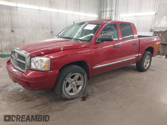 2007 Dodge Dakota SLT with VIN 1D7HW48J77S119738, listed as a IAAI auction lot 43119995 with 159,735 mi miles and . Bid and sale history available at DreamBid. Image 2.