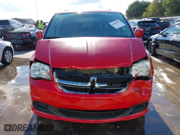 2015 Dodge Grand Caravan SXT with VIN 2C4RDGCG4FR585175, listed as a IAAI auction lot 43407444 with 104,404 mi miles and . Bid and sale history available at DreamBid. Image 6.