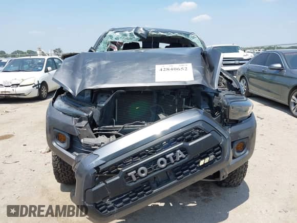2021 Toyota Tacoma SR5 with VIN 5TFAZ5CN1MX118036, listed as a IAAI auction lot 42840652 with 73,082 mi miles and . Bid and sale history available at DreamBid. Image 12.