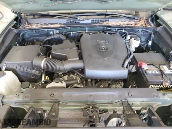 2022 Toyota Tacoma TRD Off Road z VIN 3TMCZ5AN0NM489305, wystawiony jako Copart lot #85562145 z przebiegiem 63 902 mil mil oraz Szkoda całkowita • Salvage title. Historia ofert i sprzedaży dostępna na DreamBid. Obrazek 11.