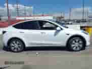 2023 Tesla Model Y Long Range z VIN 7SAYGDEE9PA081036, wystawiony jako IAAI lot #43151161 z przebiegiem 49 637 mil mil oraz . Historia ofert i sprzedaży dostępna na DreamBid. Obrazek 13.
