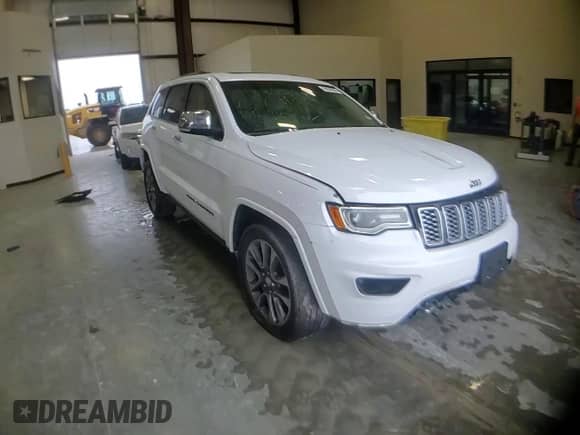 2017 Jeep Grand Cherokee Overland with VIN 1C4RJECG9HC916342, listed as a Copart auction lot 60658285 with 59,470 mi miles and Salvage title. Bid and sale history available at DreamBid. Image 13.