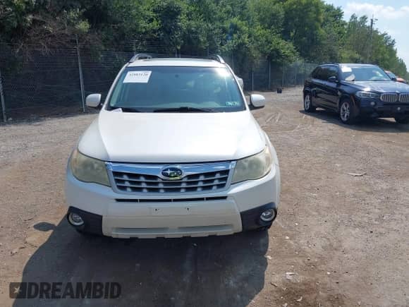 2012 Subaru Forester X Limited z VIN JF2SHAFC5CH440196, wystawiony jako IAAI lot #42883120 z przebiegiem 174 671 mil mil oraz . Historia ofert i sprzedaży dostępna na DreamBid. Obrazek 6.