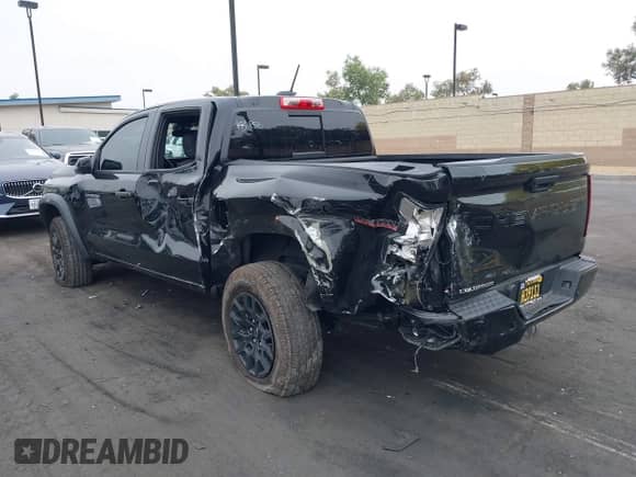 2024 Chevrolet Colorado 4WD Trail Boss with VIN 1GCPTEEK1R1130034, listed as a IAAI auction lot 42404431 with 8,664 mi miles and . Bid and sale history available at DreamBid. Image 3.