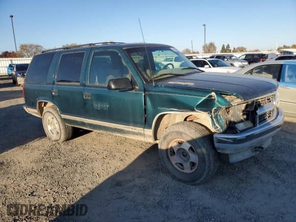 1995 Chevrolet Tahoe с VIN 1GNEK13K0SJ445250, выставлен на аукционе Copart как лот 82987024 с пробегом 125 517 миль миль и Списание • Salvage title. История ставок и продаж доступна на DreamBid. Изображение 4.