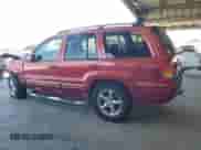 2002 Jeep Grand Cherokee Limited with VIN 1J4GW58N12C202691, listed as a Copart auction lot 64265975 with 118,480 mi miles and Salvage title. Bid and sale history available at DreamBid. Image 2.