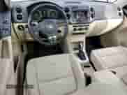 2013 Volkswagen Tiguan SE z VIN WVGAV3AX8DW059220, wystawiony jako Copart lot #49921455 z przebiegiem 138 666 mil mil oraz Szkoda całkowita • Salvage title. Historia ofert i sprzedaży dostępna na DreamBid. Obrazek 8.