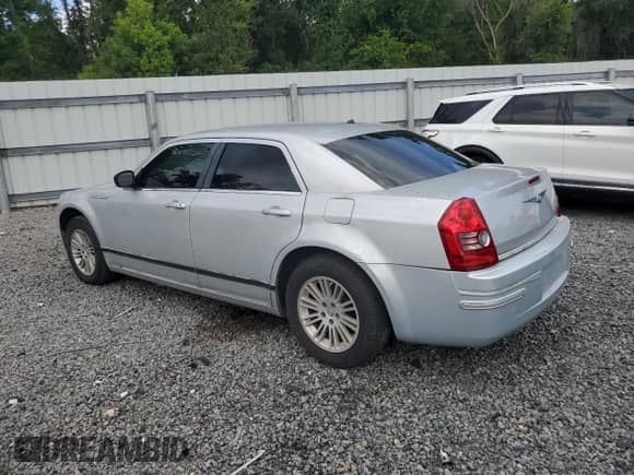 2009 Chrysler 300 LX with VIN 2C3KA43D79H577844, listed as a Copart auction lot 65502145 with 119,286 mi miles and Clean title. Bid and sale history available at DreamBid. Image 2.