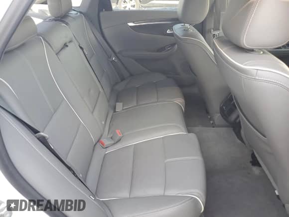 2017 Chevrolet Impala Premier z VIN 1G1145S32HU164294, wystawiony jako Copart lot #70271965 z przebiegiem 130 435 mil mil oraz Szkoda całkowita • Salvage title. Historia ofert i sprzedaży dostępna na DreamBid. Obrazek 10.