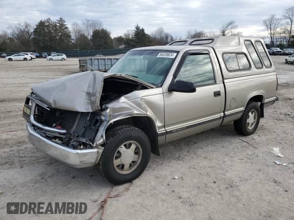 1998 GMC Sierra 1500 z VIN 1GTEC14W0WZ526005, wystawiony jako Copart lot #86539824 z przebiegiem 206 094 mil mil oraz Czysty tytuł • Clean title. Historia ofert i sprzedaży dostępna na DreamBid. Obrazek 1.