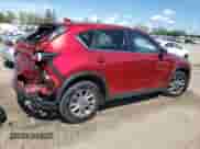 2022 Mazda CX-5 S Preferred z VIN JM3KFBCM0N0626714, wystawiony jako Copart lot #71184735 z przebiegiem 22 941 mil mil oraz Szkoda całkowita • Salvage title. Historia ofert i sprzedaży dostępna na DreamBid. Obrazek 3.