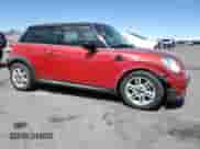 2011 MINI Hardtop with VIN WMWSU3C5XBT093162, listed as a Copart auction lot 54871315 with 171,220 mi miles and Salvage title. Bid and sale history available at DreamBid. Image 4.