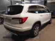 2021 Honda Pilot EX with VIN 5FNYF6H3XMB079395, listed as a IAAI auction lot 41882789 with 37,662 mi miles and . Bid and sale history available at DreamBid. Image 4.