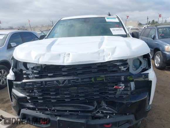 2022 Chevrolet Silverado 1500 Custom Trail Boss with VIN 3GCPYCEK3NG147175, listed as a IAAI auction lot 38760584 with 9,256 mi miles and . Bid and sale history available at DreamBid. Image 12.