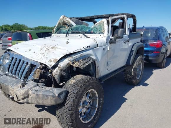 2013 Jeep Wrangler Rubicon 10th Anniversary with VIN 1C4BJWCG4DL533216, listed as a IAAI auction lot 42323743 with Not provided miles and . Bid and sale history available at DreamBid. Image 2.