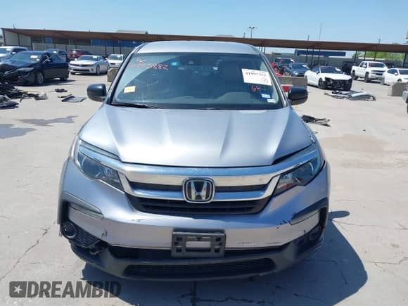 2019 Honda Pilot LX z VIN 5FNYF5H17KB043556, wystawiony jako IAAI lot #41995882 z przebiegiem 113 203 mil mil oraz . Historia ofert i sprzedaży dostępna na DreamBid. Obrazek 11.