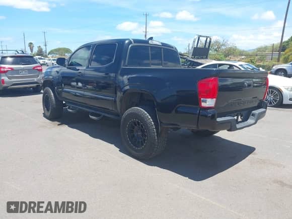 2016 Toyota Tacoma SR5 z VIN 5TFAX5GN9GX073786, wystawiony jako IAAI lot #42758858 z przebiegiem 77 042 mil mil oraz . Historia ofert i sprzedaży dostępna na DreamBid. Obrazek 3.