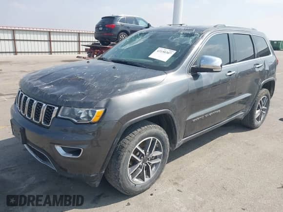 2021 Jeep Grand Cherokee 80th Anniversary with VIN 1C4RJFBG9MC550786, listed as a IAAI auction lot 43150307 with 63,701 mi miles and . Bid and sale history available at DreamBid. Image 2.