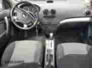 2011 Chevrolet Aveo 1LT z VIN KL1TD6DE3BB199294, wystawiony jako Copart lot #55754725 z przebiegiem 52 606 mil mil oraz Szkoda całkowita • Salvage title. Historia ofert i sprzedaży dostępna na DreamBid. Obrazek 8.