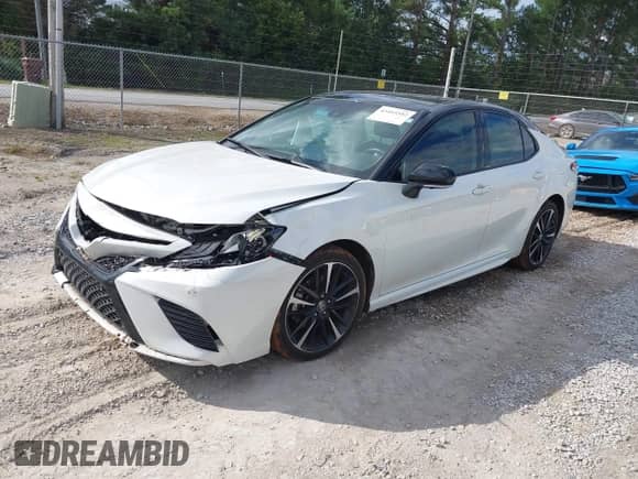 2020 Toyota Camry XSE z VIN 4T1K61AK6LU367572, wystawiony jako IAAI lot #43415552 z przebiegiem 99 436 mil mil oraz . Historia ofert i sprzedaży dostępna na DreamBid. Obrazek 2.