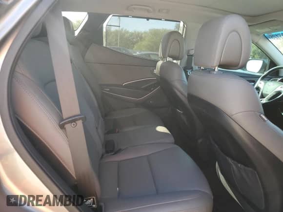 2015 Hyundai Santa Fe z VIN 5XYZU3LB5FG284321, wystawiony jako Copart lot #86295125 z przebiegiem 106 640 mil mil oraz Szkoda całkowita • Salvage title. Historia ofert i sprzedaży dostępna na DreamBid. Obrazek 11.