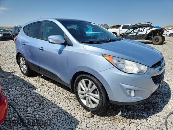 2011 Hyundai Tucson GLS с VIN KM8JUCAC4BU282492, выставлен на аукционе Copart как лот 71505465 с пробегом 171 576 миль миль и Списание • Salvage title. История ставок и продаж доступна на DreamBid. Изображение 4.