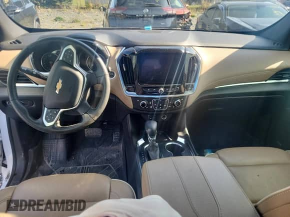 2023 Chevrolet Traverse Premier с VIN 1GNEVKKW7PJ306371, выставлен на аукционе Copart как лот 84537855 с пробегом Не указан миль и Списание • Salvage title. История ставок и продаж доступна на DreamBid. Изображение 8.