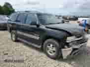 2003 Chevrolet Tahoe LT with VIN 1GNEC13Z23R145867, listed as a Copart auction lot 56762795 with 308,881 mi miles and Salvage title. Bid and sale history available at DreamBid. Image 4.
