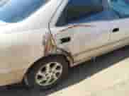 1997 Toyota Camry LE z VIN JT2BF22K5V0069221, wystawiony jako IAAI lot #43226716 z przebiegiem 173 501 mil mil oraz . Historia ofert i sprzedaży dostępna na DreamBid. Obrazek 6.