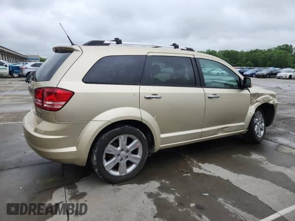 2010 Dodge Journey R/T with VIN 3D4PG6FV7AT108543, listed as a Copart auction lot 61008685 with 160,890 mi miles and Salvage title. Bid and sale history available at DreamBid. Image 3.