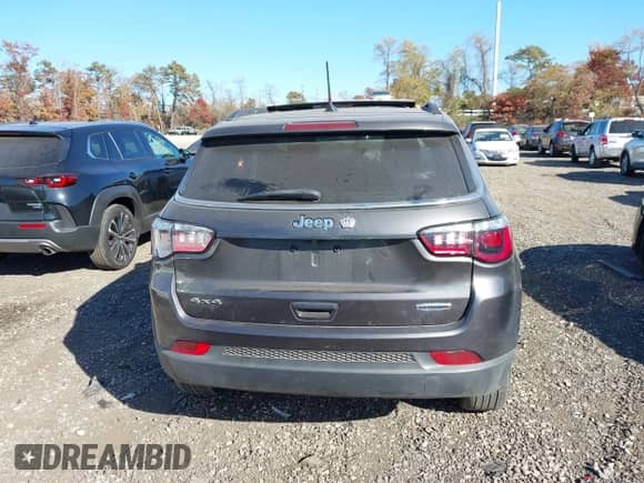 2021 Jeep Compass Latitude with VIN 3C4NJDBB8MT537958, listed as a IAAI auction lot 40705924 with 73,319 mi miles and . Bid and sale history available at DreamBid. Image 17.