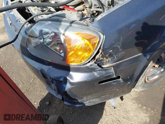 2005 Hyundai Accent GLS z VIN KMHCG35C95U365902, wystawiony jako IAAI lot #41715161 z przebiegiem 149 766 mil mil oraz . Historia ofert i sprzedaży dostępna na DreamBid. Obrazek 6.