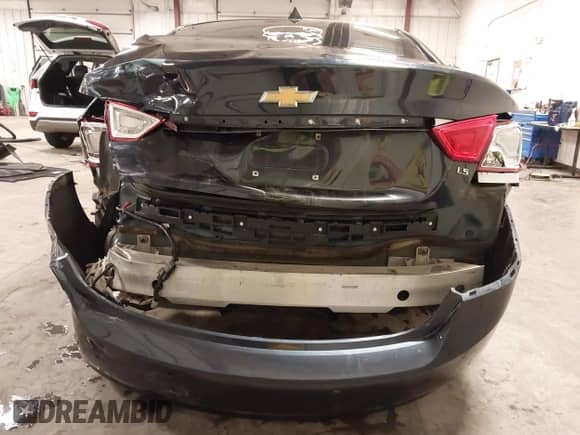 2014 Chevrolet Impala LS z VIN 2G11Y5SL0E9111817, wystawiony jako IAAI lot #43312938 z przebiegiem 190 699 mil mil oraz . Historia ofert i sprzedaży dostępna na DreamBid. Obrazek 6.