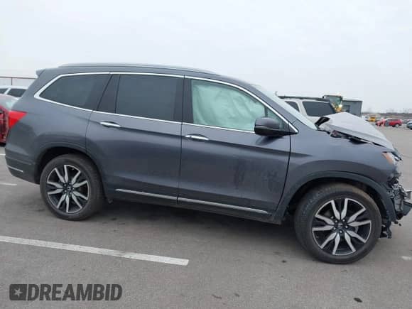 2021 Honda Pilot Touring 7-Passenger z VIN 5FNYF6H67MB078876, wystawiony jako IAAI lot #41457787 z przebiegiem 56 473 mil mil oraz . Historia ofert i sprzedaży dostępna na DreamBid. Obrazek 14.