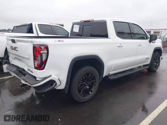 2023 GMC Sierra 1500 Elevation with VIN 3GTUUCE84PG287144, listed as a IAAI auction lot 43321547 with 56,502 mi miles and . Bid and sale history available at DreamBid. Image 4.