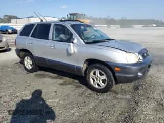 2003 Hyundai Santa Fe GLS с VIN KM8SC13E93U521854, выставлен на аукционе Copart как лот 74481814 с пробегом 242 069 миль миль и Списание • Salvage title. История ставок и продаж доступна на DreamBid. Изображение 4.