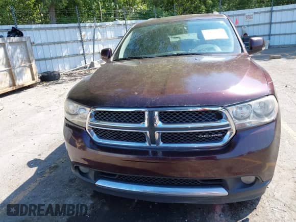 2012 Dodge Durango Crew with VIN 1C4RDJDG1CC153000, listed as a IAAI auction lot 43136614 with 186,788 mi miles and . Bid and sale history available at DreamBid. Image 12.